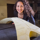 Masters of engineering student Karly Bast shows off the scale model of a bridge designed by Leonardo da Vinci that she and her co-workers used to prove the design’s feasibility.